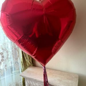 Grand Romantic Surprise with an XXL Heart Balloon